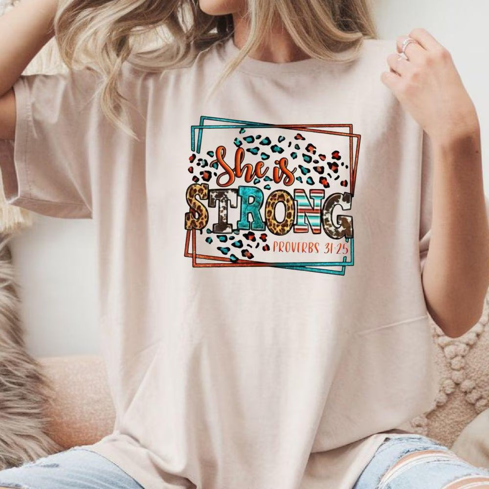 She Is Strong DTF Transfer – Proverbs 31:25 Bible Verse | Leopard Print Christian Graphic | 10" Adult Size | Ready to Press Heat Transfer
